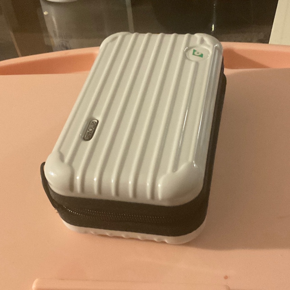 RIMOWA White and Black amenities case collectible